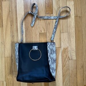 Able Black Crossbody with Snake-Print Trim and Gold Ring